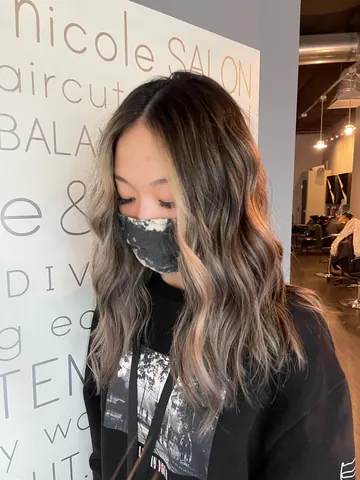 Dark roots melting into blonde ribbons, balayage by Tian in Lacey, WA