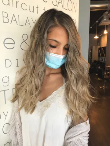 Long honey-blonde balayage waves, lived-in color by Tian
