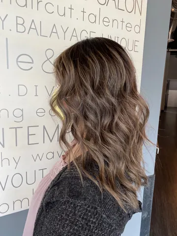 Soft brown waves with lived-in highlights