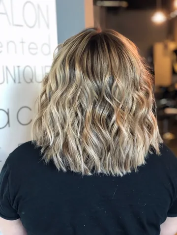 Textured blonde lob with soft balayage by Tian, hair stylist in Lacey, WA